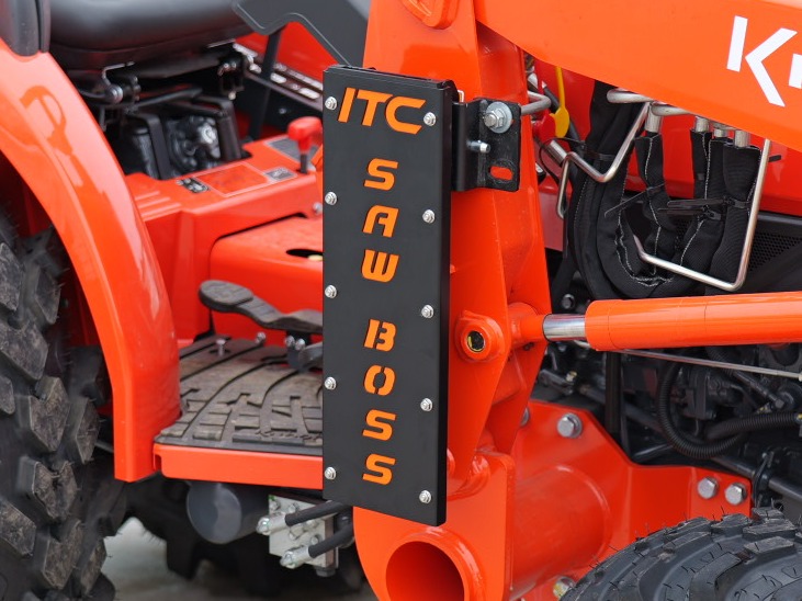 ITC Saw Boss chainsaw carrier mounted on a tractor loader